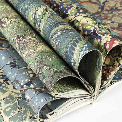 Libro con 12 papeles de regalo - 102 Marbled Designs