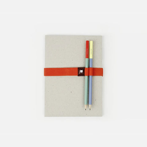 Correa portabolígrafos para cuaderno