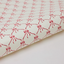 Papel regalo algodón 50x70cm - Lazos rosas